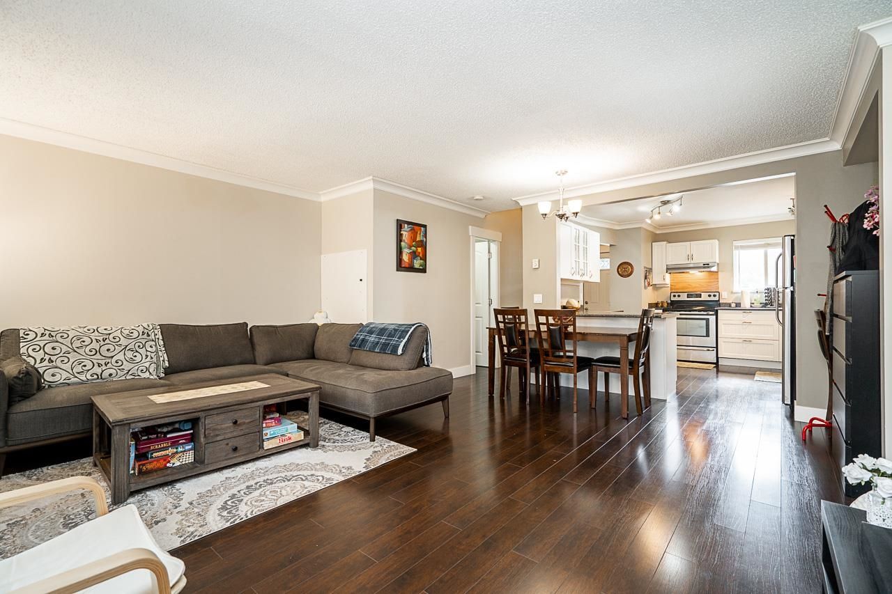 Main Photo: 51 6637 138 Street in Surrey: East Newton Townhouse for sale in "Hyland" : MLS®# R2766291