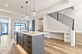 Photo 8: 418 24 Avenue NE in Calgary: Winston Heights/Mountview Semi Detached (Half Duplex) for sale : MLS®# A2126433