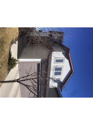 Photo 1: 222 TUSCANY RAVINE Close NW in Calgary: Tuscany House for sale : MLS®# C4046494