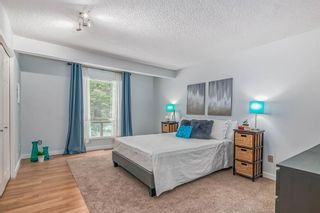 Photo 18: 106 Strathlorne Mews SW in Calgary: Strathcona Park Row/Townhouse for sale : MLS®# A2028228