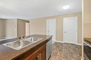 Photo 11: 9404 403 Mackenzie Way SW: Airdrie Apartment for sale : MLS®# A2010407