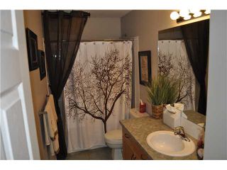 Photo 10: 27 103 FAIRWAYS Drive NW: Airdrie Townhouse for sale : MLS®# C3524229