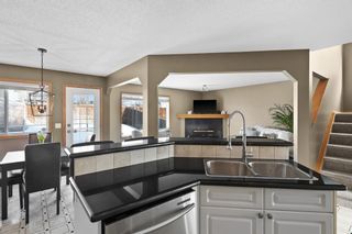 Photo 11: 144 Tuscany Ridge View NW in Calgary: Tuscany Detached for sale : MLS®# A2031739