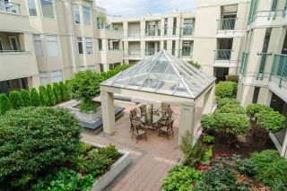 Photo 2: 206 20680 56 Avenue in Langley: Langley City Condo for sale in "CASSOLA COURT" : MLS®# R2402212