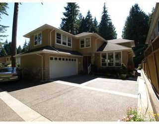 Photo 1: 4939 Capilano Road in North Vancouver: Canyon Heights NV House for sale : MLS®# V775746