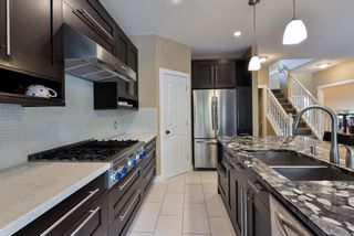 Photo 10: 7866 Springbank Way SW in Calgary: Springbank Hill Detached for sale : MLS®# A1232036