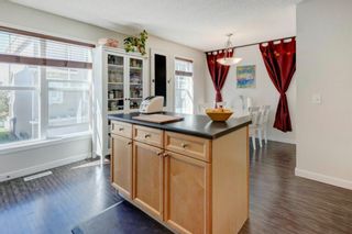 Photo 11: 322 Toscana Gardens NW in Calgary: Tuscany Row/Townhouse for sale : MLS®# A1216399