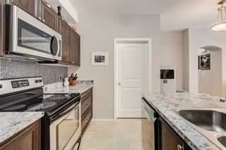 Photo 8: 104 11 Panatella Landing NW in Calgary: Panorama Hills Row/Townhouse for sale : MLS®# A2029988