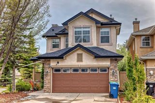 Photo 1: 13 Everwillow Boulevard SW in Calgary: Evergreen Detached for sale : MLS®# A2133539
