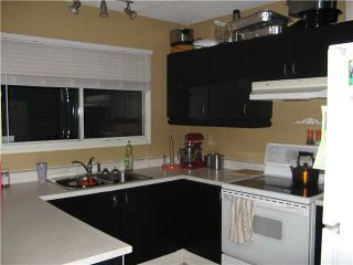 Photo 5: 100 GLENHILL Drive in : Cochrane Residential Detached Single Family for sale : MLS®# C3592319