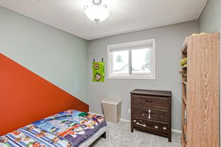 Photo 20: 591 Woodpark Boulevard SW in Calgary: Woodlands Detached for sale : MLS®# A2021172