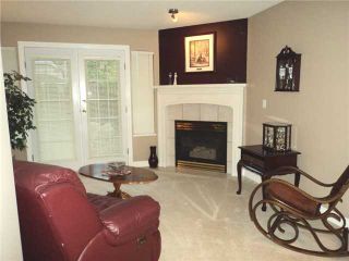 Photo 2: 43 1255 RIVERSIDE Drive in Port Coquitlam: Riverwood Townhouse for sale in "RIVERWOOD GREEN" : MLS®# V901232