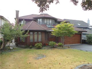 Photo 1: 7366 UNION Street in Burnaby: Simon Fraser Univer. House for sale (Burnaby North)  : MLS®# V994793