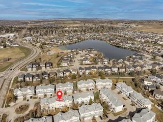 Photo 28: 21 Crystal Shores Cove: Okotoks Row/Townhouse for sale : MLS®# A2126777