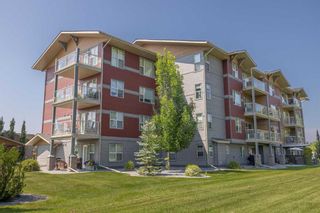 Photo 1: 406 5901 71 Avenue: Rocky Mountain House Apartment for sale : MLS®# A2068503