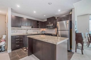 Photo 4: 1807 77 Spruce Place SW in Calgary: Spruce Cliff Apartment for sale : MLS®# A2062737