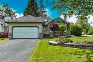 Photo 1: 21404 86A Crescent in Langley: Walnut Grove House for sale in "FOREST HILLS" : MLS®# R2895452