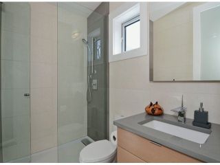 Photo 17: 2048 WHYTE Avenue in Vancouver: Kitsilano 1/2 Duplex for sale in "Kits Point" (Vancouver West)  : MLS®# V1055098
