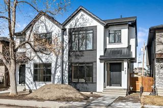 Photo 1: 420 24 Avenue NE in Calgary: Winston Heights/Mountview Semi Detached (Half Duplex) for sale : MLS®# A2115046