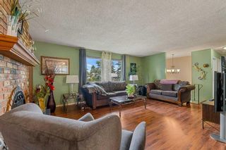Photo 5: 179 Silver Brook Road NW in Calgary: Silver Springs Detached for sale : MLS®# A2059476