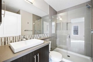 Photo 21: 422 Ascot Circle SW in Calgary: Aspen Woods Row/Townhouse for sale : MLS®# A2124420