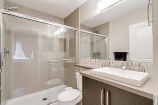 Photo 30: 235 ASCOT Circle SW in Calgary: Aspen Woods Row/Townhouse for sale : MLS®# A1025064