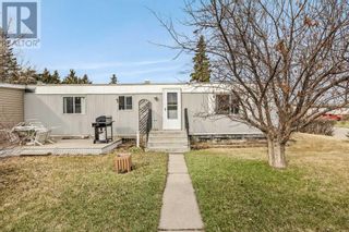 Photo 2: 1211 Downie Street in Carstairs: House for sale : MLS®# A2127071
