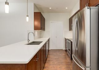 Photo 2: 307 22 Auburn Bay Link SE in Calgary: Auburn Bay Apartment for sale : MLS®# A1165962
