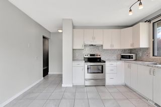 Photo 13: 318 Ranchview Court NW in Calgary: Ranchlands Row/Townhouse for sale : MLS®# A2050825