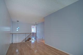Photo 20: 33 12625 24 Street SW in Calgary: Woodbine Row/Townhouse for sale : MLS®# A1024198