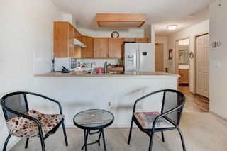 Photo 8: 411 305 1 Avenue NW: Airdrie Apartment for sale : MLS®# A1190480