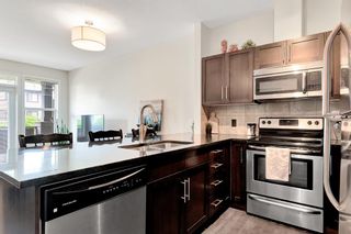 Photo 9: 307 76 Panatella Road NW in Calgary: Panorama Hills Apartment for sale : MLS®# A2051167