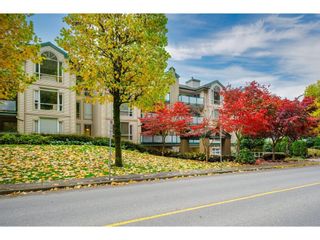 Photo 1: 211 19142 122ND Avenue in Pitt Meadows: Central Meadows Condo for sale in "PARKWOOD MANOR" : MLS®# R2628244