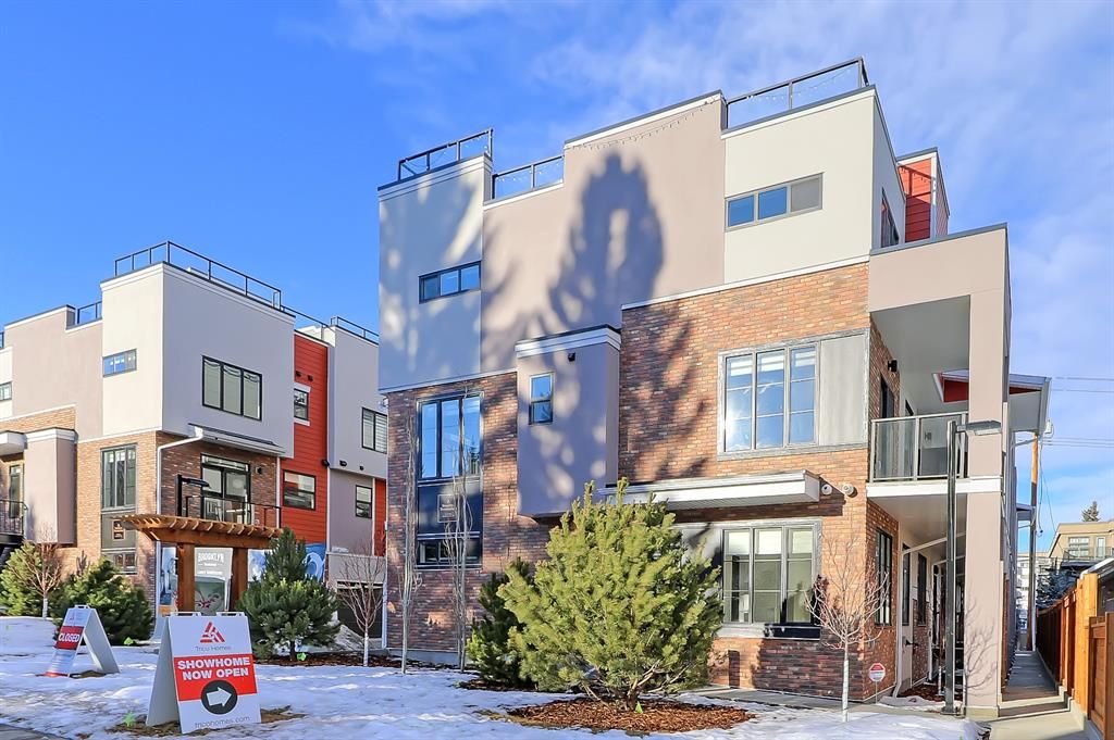 Main Photo: 12 1710 28 Avenue SW in Calgary: South Calgary Row/Townhouse for sale : MLS®# A1173097
