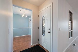 Photo 2: 430 Cannington Close SW in Calgary: Canyon Meadows Row/Townhouse for sale : MLS®# A2091611