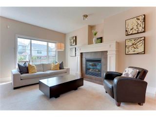 Photo 3: 257 COUGARTOWN Circle SW in Calgary: Cougar Ridge House for sale : MLS®# C4025299