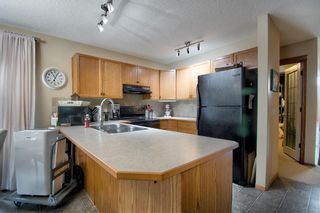 Photo 6: 584 Stonegate Way NW: Airdrie Semi Detached for sale : MLS®# A1245597