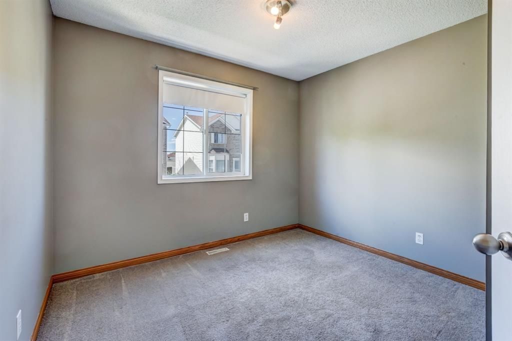 Photo 19: Photos: 115 Citadel Lane NW in Calgary: Citadel Row/Townhouse for sale : MLS®# A1123184