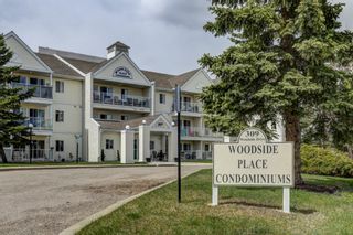 Photo 1: 206 309 Woodside Drive NW: Airdrie Apartment for sale : MLS®# A1218082