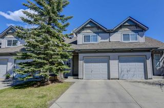 Photo 1: 35 Everstone Place SW in Calgary: Evergreen Row/Townhouse for sale : MLS®# A1221742