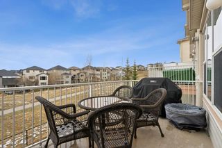 Photo 2: 295 Sunset Point: Cochrane Row/Townhouse for sale : MLS®# A2127381