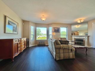 Photo 5: 109 5360 205 Street in Langley: Langley City Condo for sale in "PARKWAY ESTATES" : MLS®# R2781883