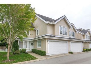 Photo 1: 16 17097 64 Avenue in Surrey: Cloverdale BC Townhouse for sale in "Kentucky Lane" (Cloverdale)  : MLS®# R2625431