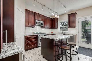 Photo 12: 220 Garrison Square SW in Calgary: Garrison Woods Row/Townhouse for sale : MLS®# A2080737