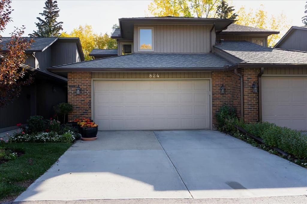 Main Photo: 824 860 Midridge Drive SE in Calgary: Midnapore Semi Detached (Half Duplex) for sale : MLS®# A2038116