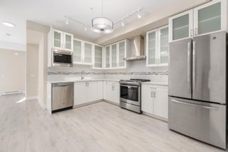 Photo 1: 307 4882 SLOCAN Street in Vancouver: Collingwood VE Condo for sale in "Slocan Park" (Vancouver East)  : MLS®# R2758316
