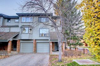 Photo 1: 143 Point Drive NW in Calgary: Point McKay Row/Townhouse for sale : MLS®# A1157621