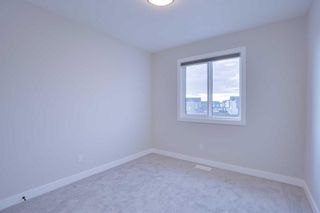 Photo 13: 167 Belvedere Green SE in Calgary: Belvedere Detached for sale : MLS®# A2141397