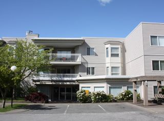 Photo 1: 206 9946 151 Street in Surrey: Guildford Condo for sale in "Westchester Place" (North Surrey)  : MLS®# R2169746