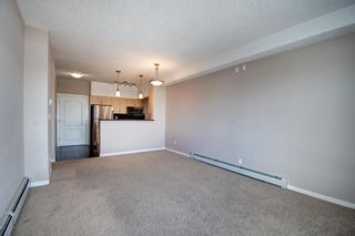 Photo 2: 1412 604 East Lake Boulevard NE: Airdrie Apartment for sale : MLS®# A2029240